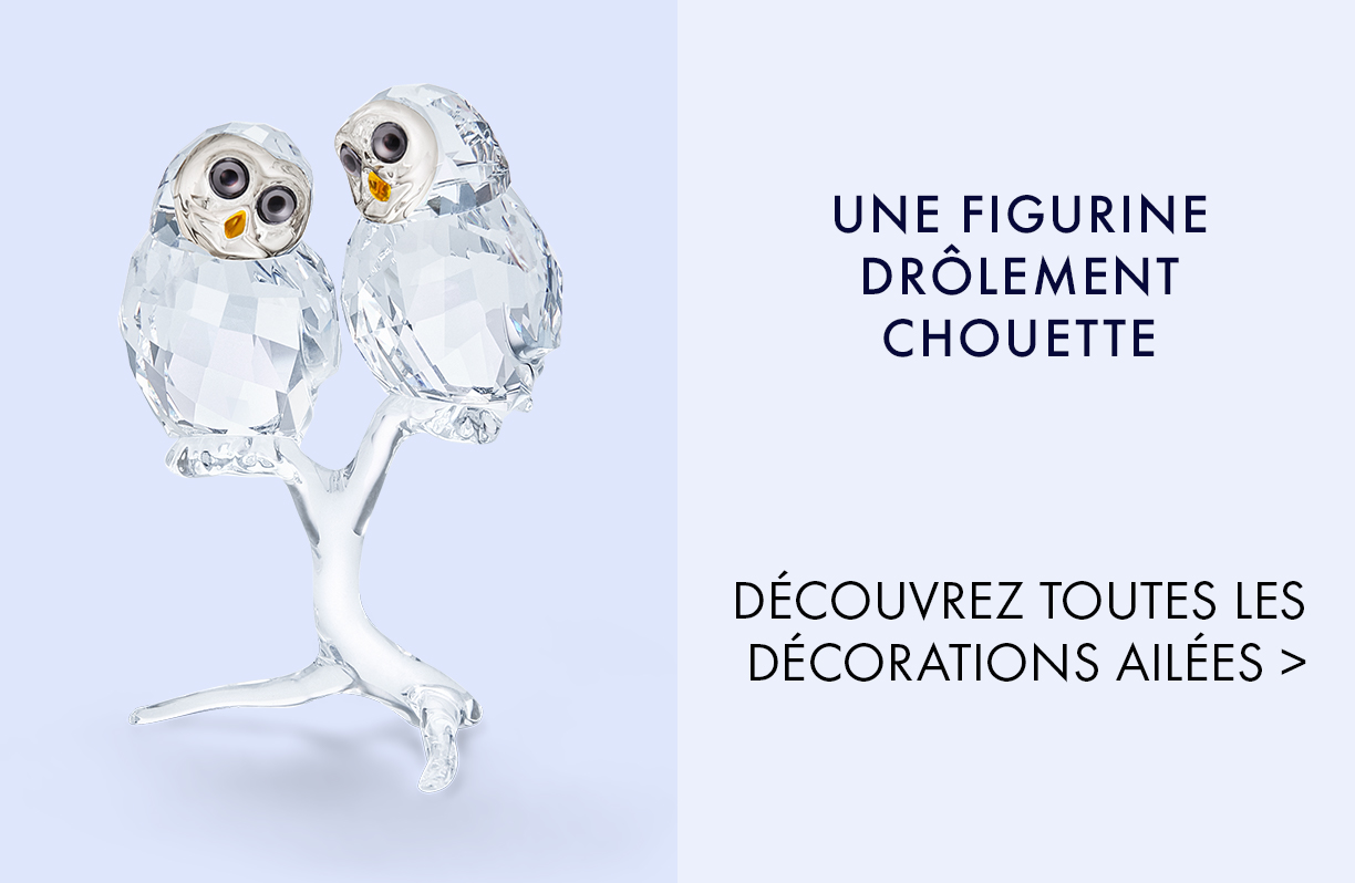 UNE FIGURINE DRÔLEMENT CHOUETTE